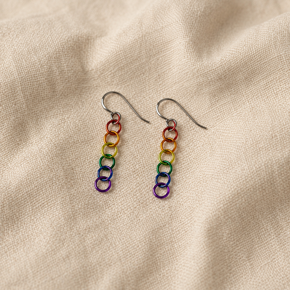 Contemporary Artisan Earrings: Pride Rainbow Rings on Hypoallergenic Niobium Wires