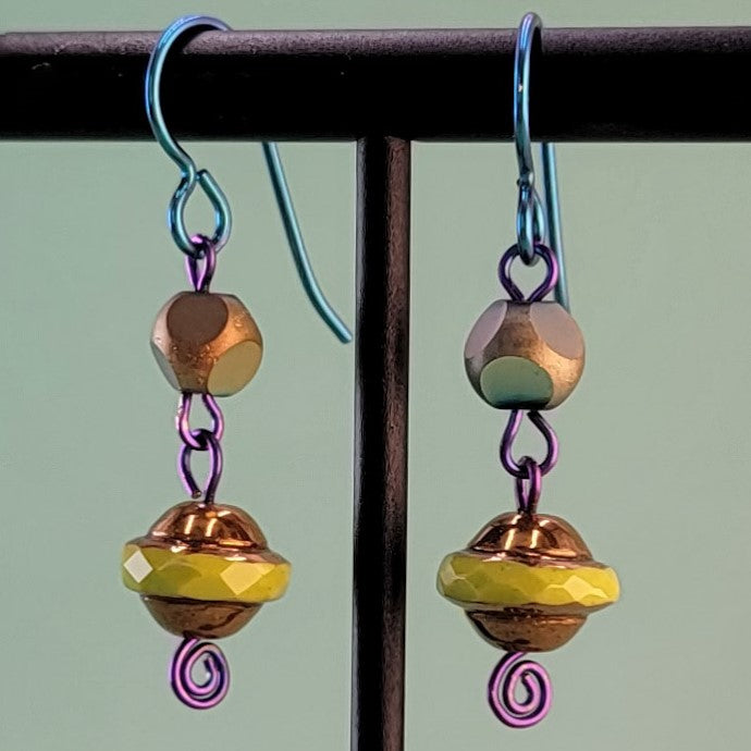 Handmade colorful Boho flying saucer earrings with bright blue hypoallergenic niobium ear wires and colorful Czech glass