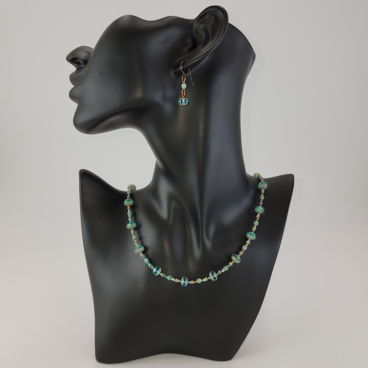 Eye-Catching Necklace Set in Aquamarine Picasso Glass with