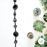 Contemporary Artisan Black & White Polka Dot Geometric Fan Pull, 16 1/2"