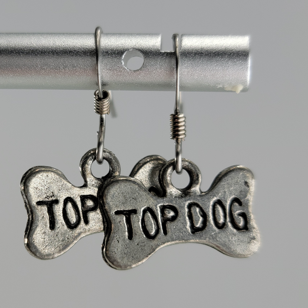 Handmade, hypoallergenic bone-shaped sign earrings with top dog printed on them