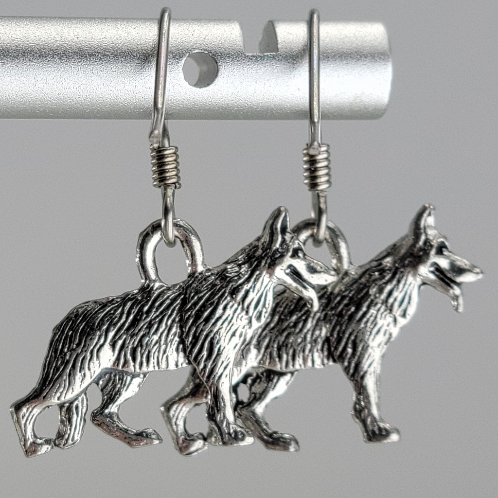 Earrings, antiqued silver tone. German shepherd dogs, standing.