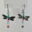 Dragonfly earrings with pewter wings and body of crystal beads in multiple colors