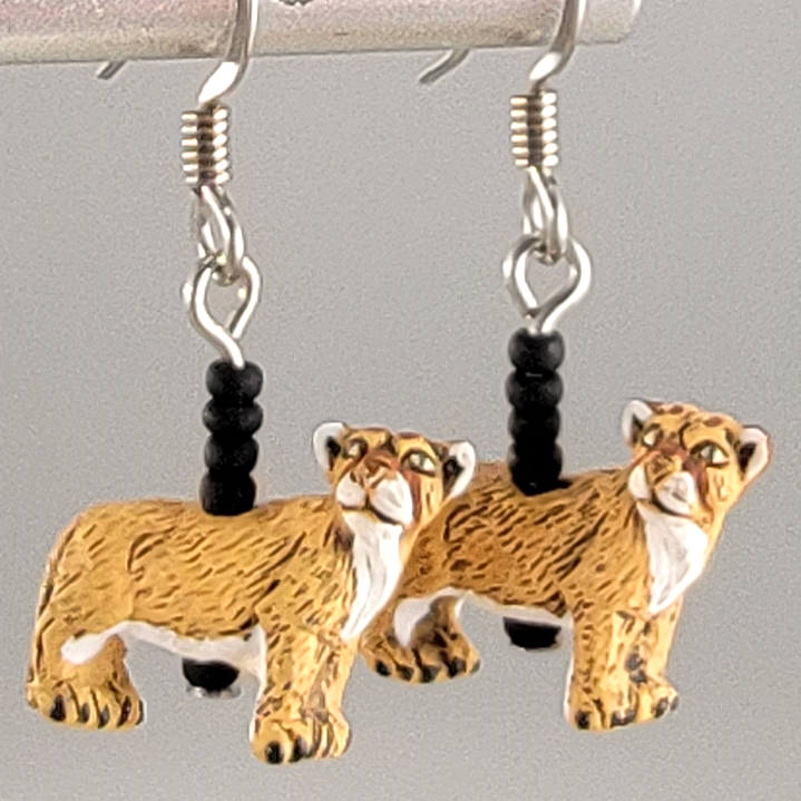 Tiny ceramic tan mountain lion charm earrings