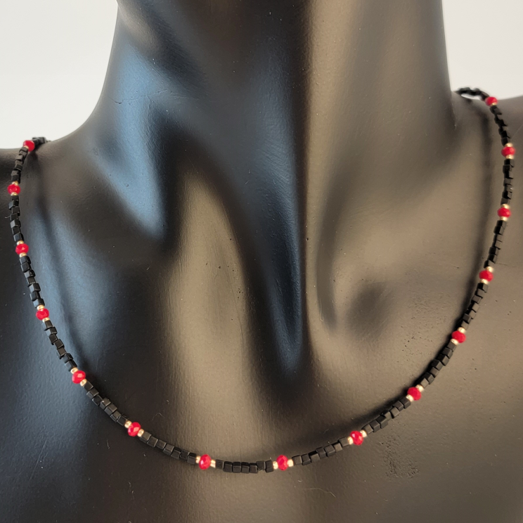 Handmade beaded black and red necklace with gold filled beads and 14 karat gold filled clasp