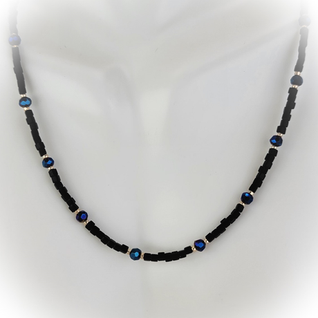 Handmade beaded black and blue necklace with gold filled beads and 14 karat gold filled clasp