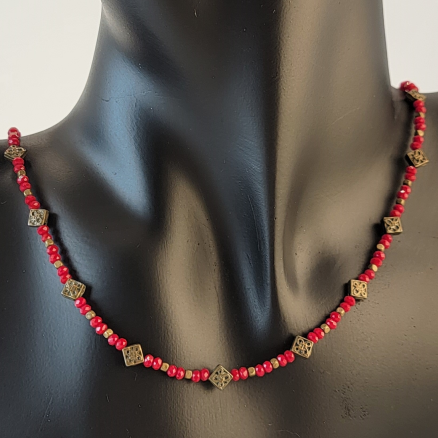 Handmade beaded necklace with red faceted beads and bronze diamond beads