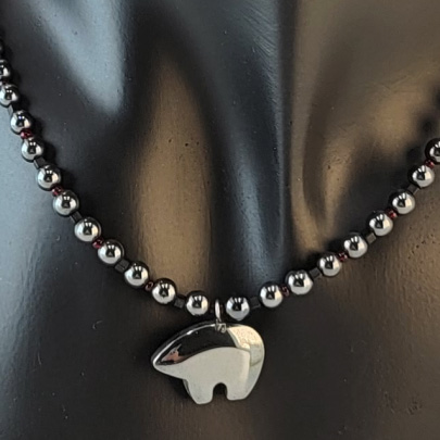 Handmade necklace with hematitve bear, hematite beads, and black and dark red accent beads