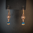 Handmade hypoallergenic earrings with turquoise blue cathedral glass beads and copper suns