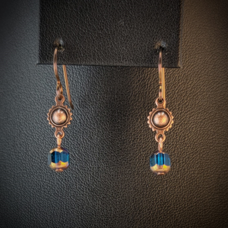 Handmade hypoallergenic earrings with turquoise blue cathedral glass beads and copper suns