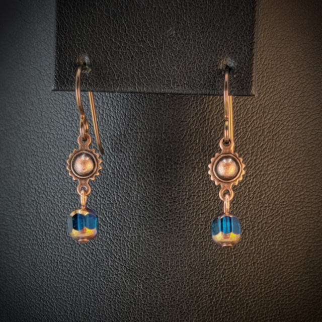 Handmade hypoallergenic earrings with turquoise blue cathedral glass beads and copper suns