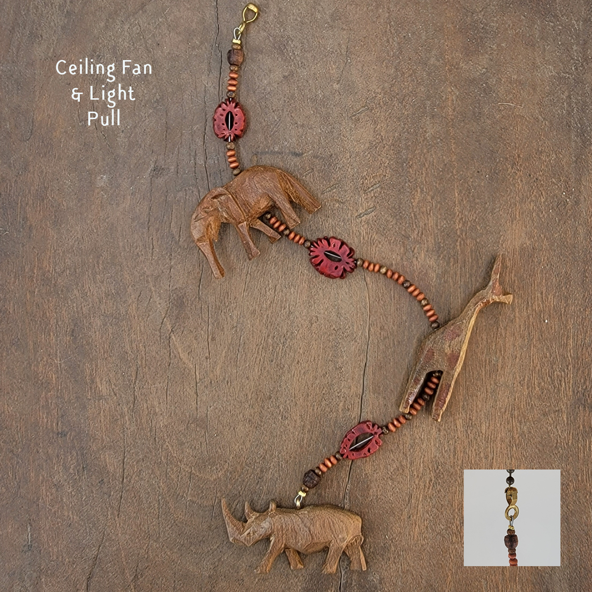 Fan or Light Pull, Elephant, Giraffe, and Two-Horned Rhino with Walnut Shell and Wood
