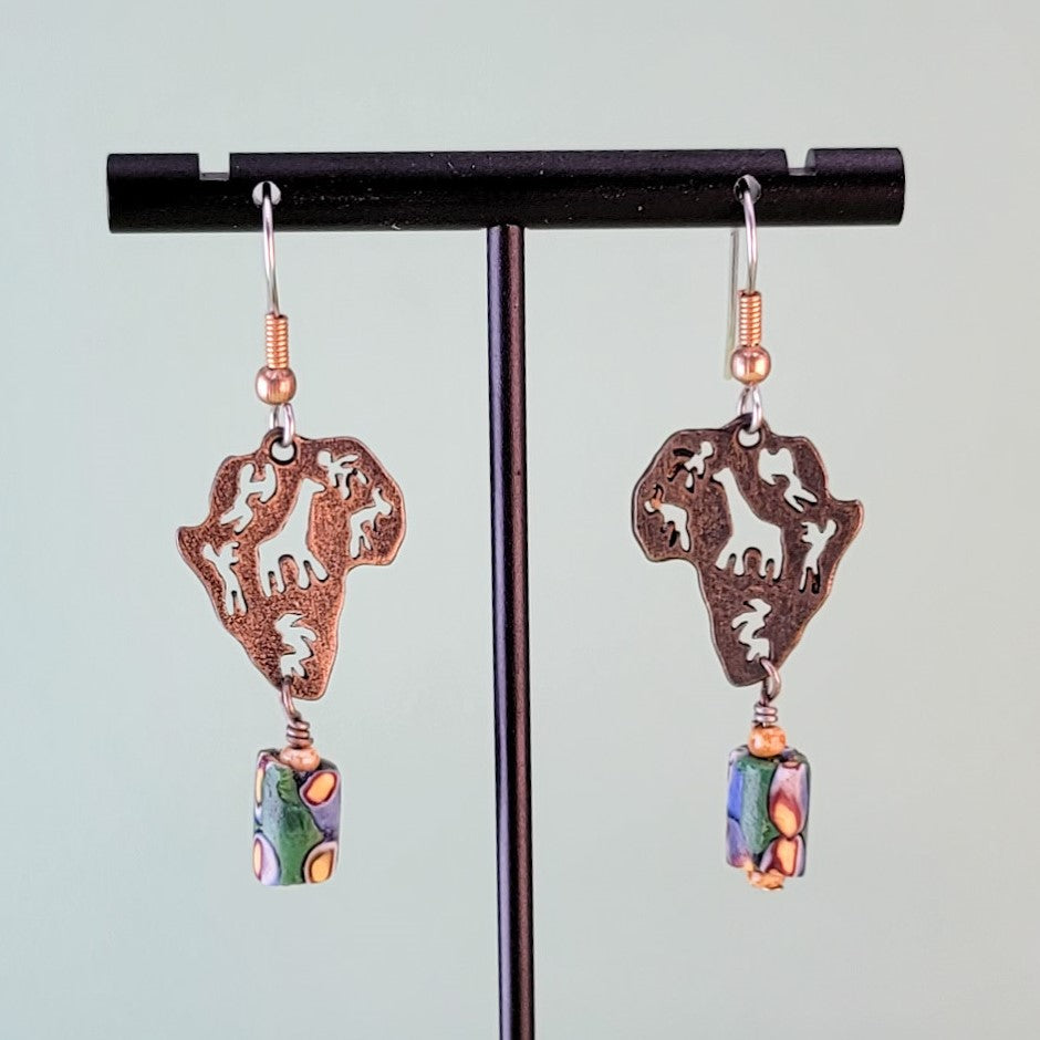 Handmade Boho earrings, African continent with wildlife cutouts and coloful clay accent beads. Ear wires are hypoallergenic surgical steel. Total earring length is 1 1/8".