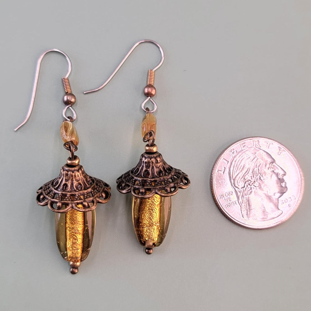 Handmade earrings with vintage amber glass, topaz-colored Czech glass, and hypoallergenic surgical steel ear wires
