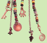 Handmade hypoallergenic colorful boho earrings with copper charm and chain accents