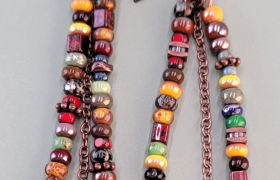 Handmade hypoallergenic colorful boho earrings with copper charm and chain accents