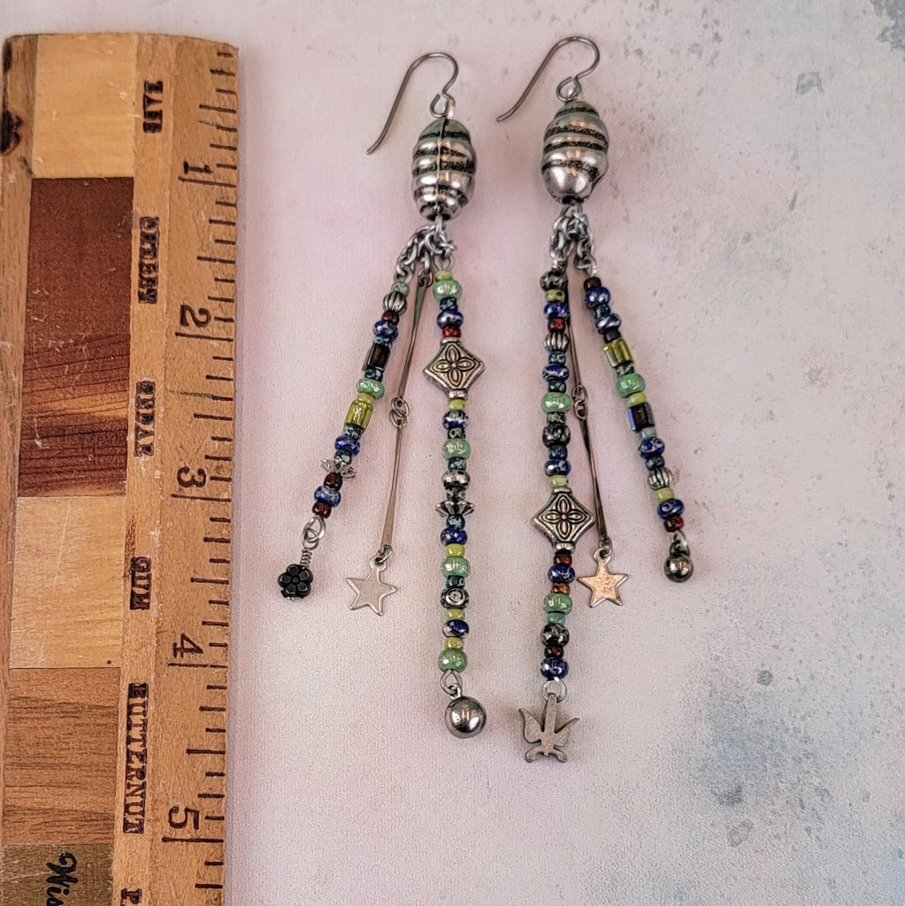 Dangly handmade Boho earrings, triple drops, dazzling blues, greens, and silver. 4 3/4" long, hypoallergenic ear wires. 