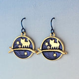 Hypoallergenic handmade cat earrings including gold cat on a branch with blue enamel background and stars