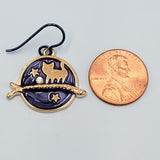 Hypoallergenic handmade cat earrings including gold cat on a branch with blue enamel background and stars
