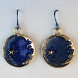 Handmade moon and star earrings including gold crescent moon and gold star with blue enamel background