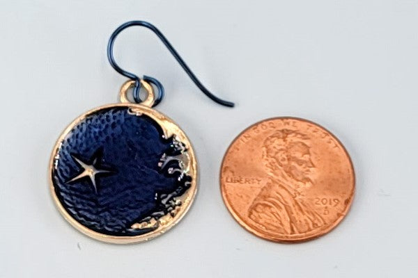 Handmade moon and star earrings including gold crescent moon and gold star with blue enamel background