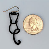Handmade black cat earrings; silhouette of cats made of powder-coated wire. Earrings are hypoallergenic.