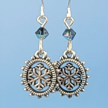Hypoallergenic snowflake earrings with detailed geometric lead-free pewter snowflake charms and Montana blue crystal