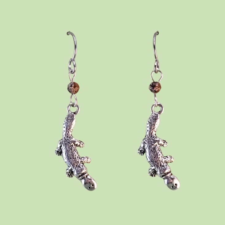 Handmade platypus earrings made with lead-free pewter platypus and brown Czech glass beads