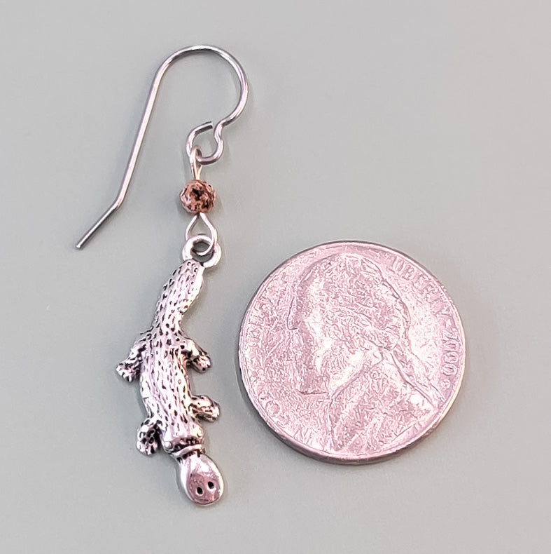 Handmade platypus earrings made with lead-free pewter platypus and brown Czech glass beads