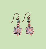 Hypoallergenic copper turtle earrings with three dimensional turtle charms and green Picasso glass beads