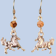 Hypoallergenic cantering horse earrings handmade with beautiful silver-colored graceful horse charms and topped with brown zebra jasper beads