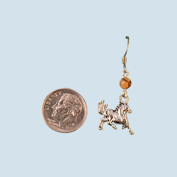 Hypoallergenic cantering horse earrings handmade with beautiful silver-colored graceful horse charms and topped with brown zebra jasper beads